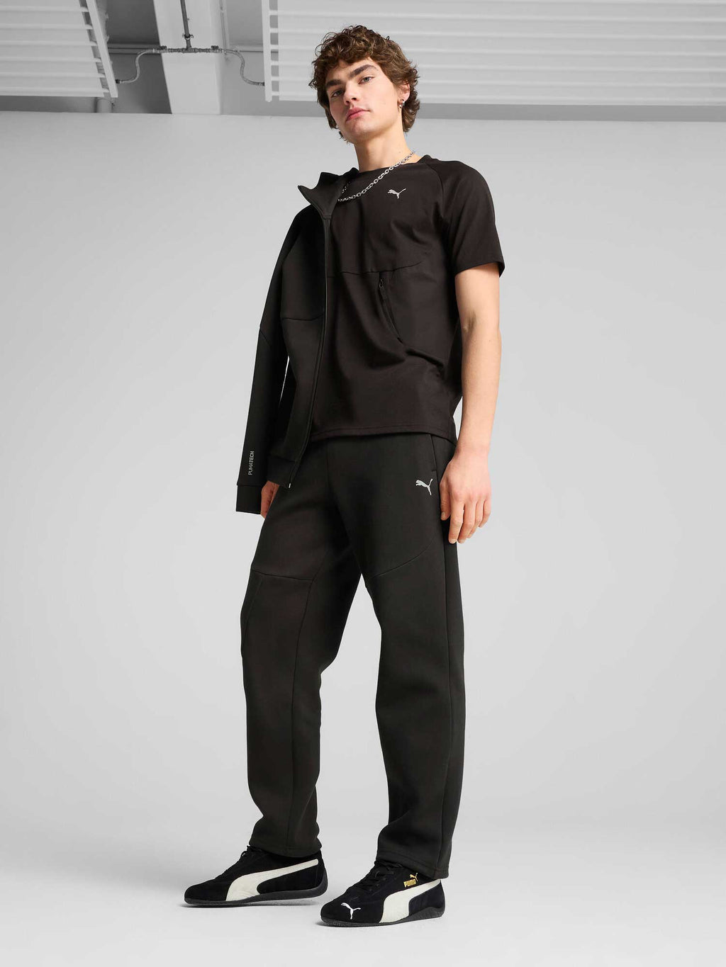 PUMA Спортно долнище PUMATECH Track Pants DK op
