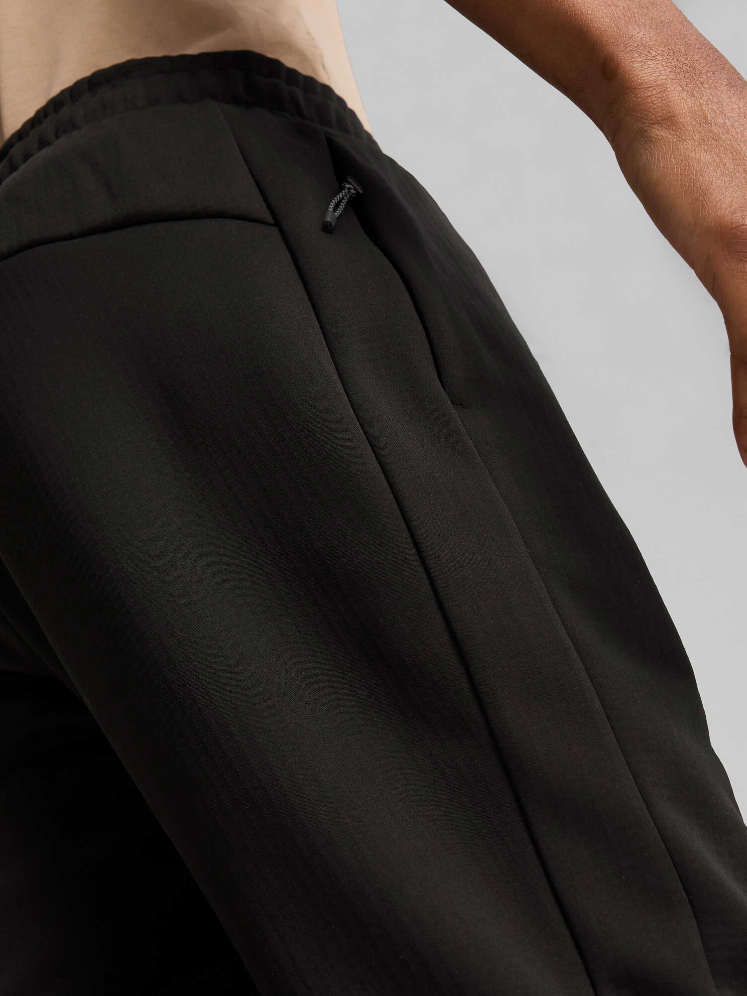 PUMA Спортно долнище EVOSTRIPE Warm Pants DK