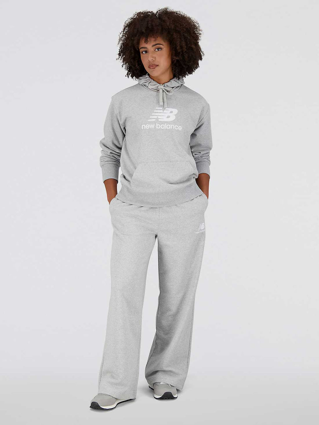 NEW BALANCE Спортно долнище ESSENTIALS STACKED LOGO