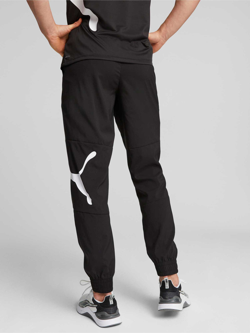 PUMA Спортно долнище Train All Day Big CAT Woven Pant