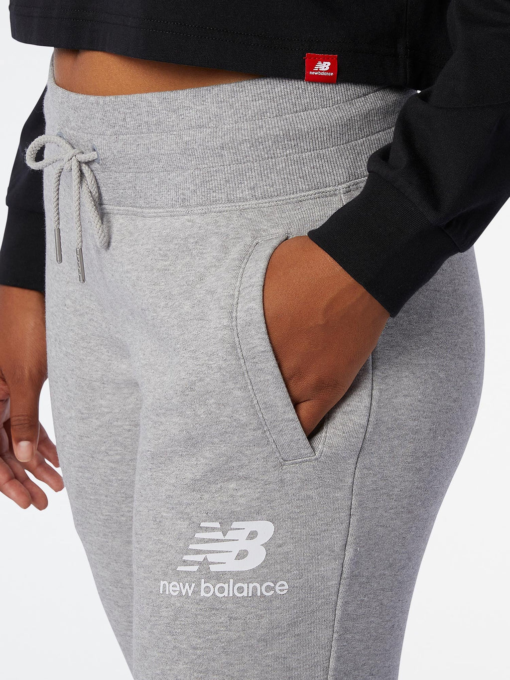 NEW BALANCE Спортно долнище ESSENTIALS FT