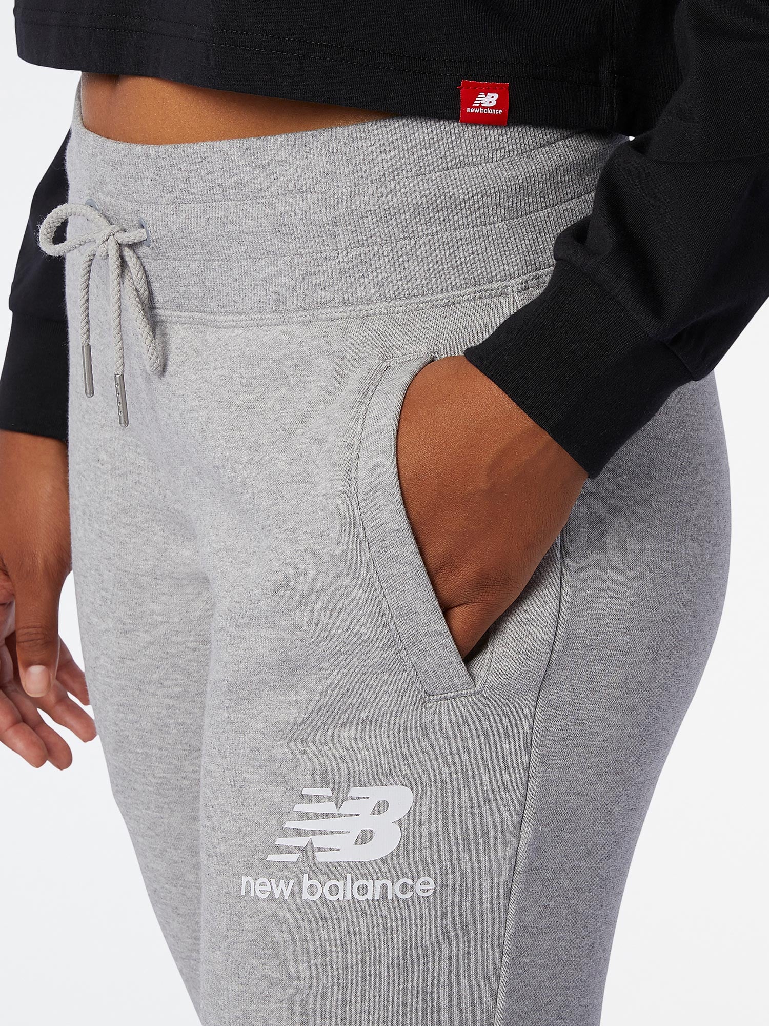 NEW BALANCE Спортно долнище ESSENTIALS FT