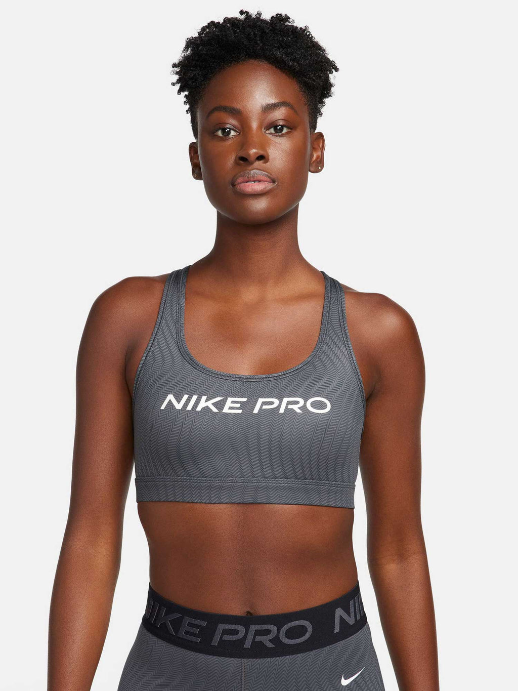 NIKE Спортен сутиен W NP SWSH LGT SPT AOP BRA