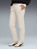 PUMA Спортно долнище EVOSTRIPE Sweatpants DK op