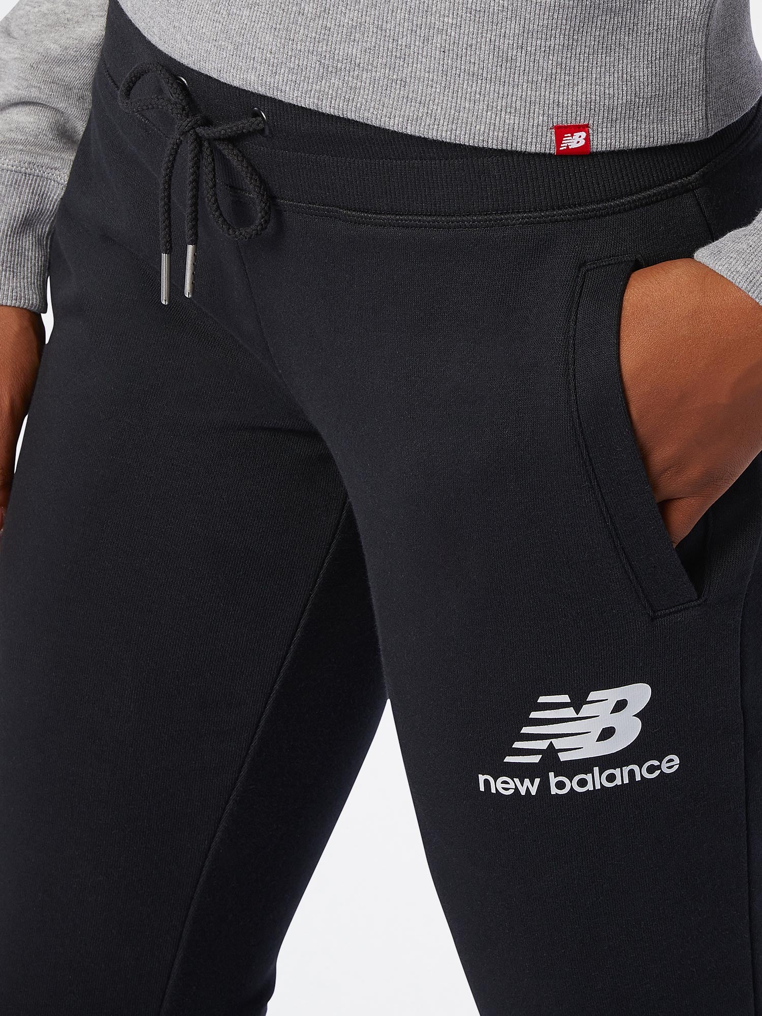NEW BALANCE Спортно долнище ESSENTIALS FT