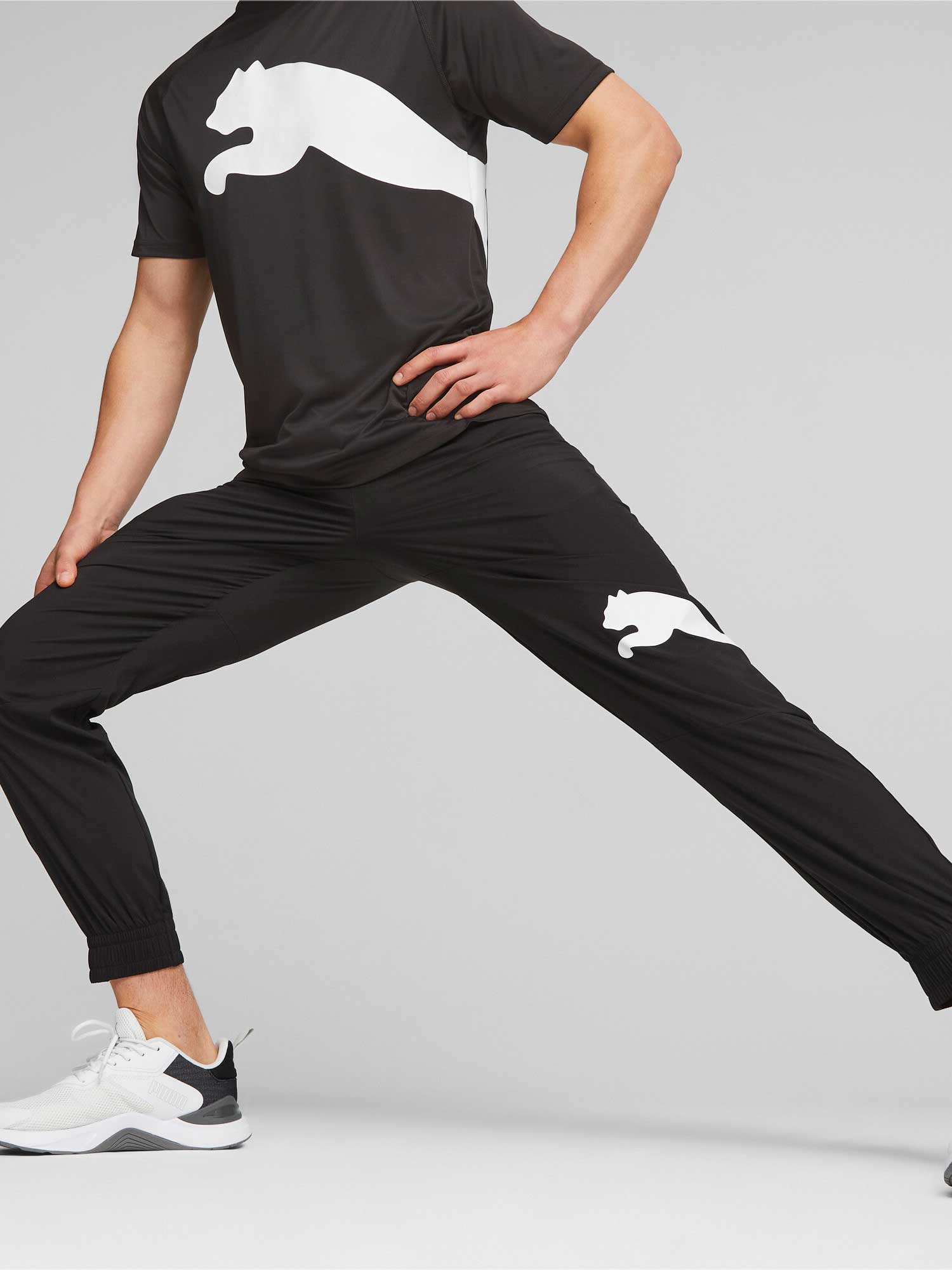 PUMA Спортно долнище Train All Day Big CAT Woven Pant