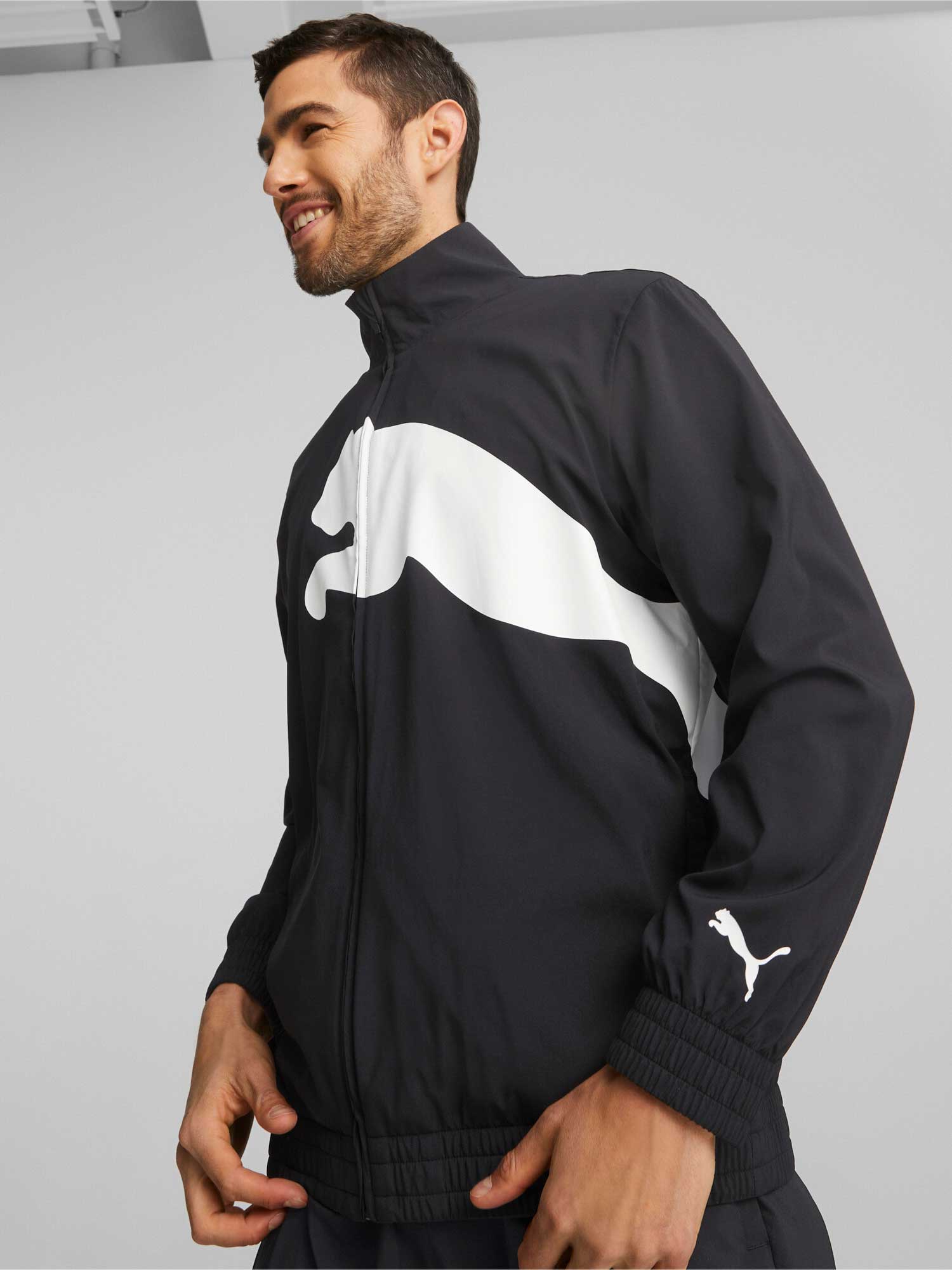 PUMA Спортно горнище TRAIN BIG CAT LINED WOVEN